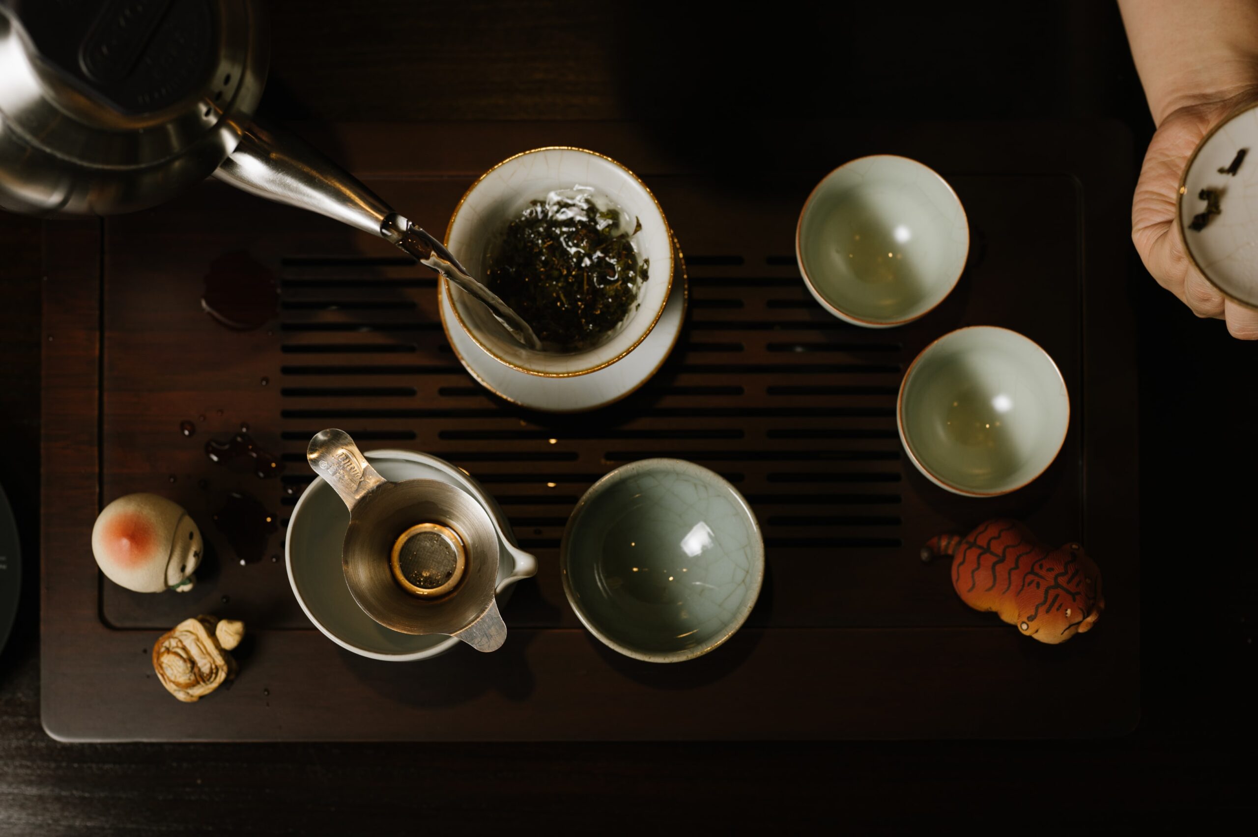 Chinese Tea in SG : Rising steam carrying the earthy aroma of mountain leaves, evoking calm and clarity.