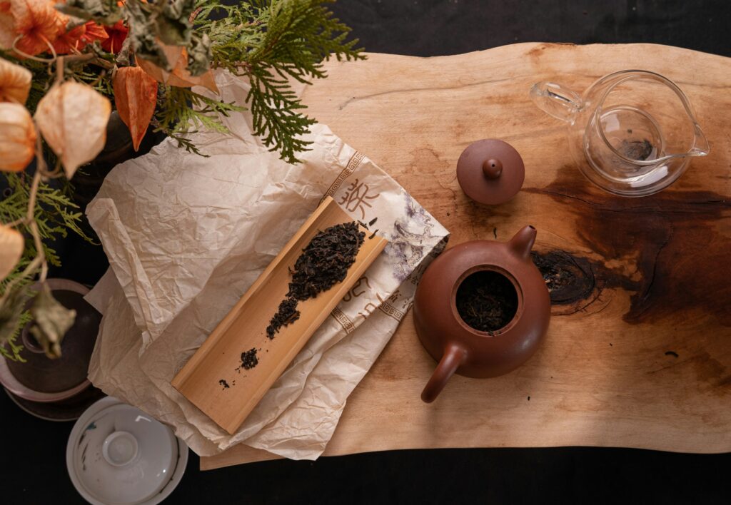 Tea Shop in SG : Close-up of loose green tea leaves at a specialty tea shops in Singapore, emphasizing natural filters, rich taste, and artisanal quality.