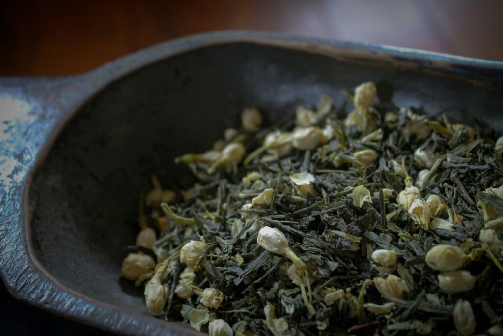 Tea Shop in SG : Close-up of loose tea leaves at a specialty tea shops in Singapore, emphasizing natural filters, rich taste, and artisanal quality
