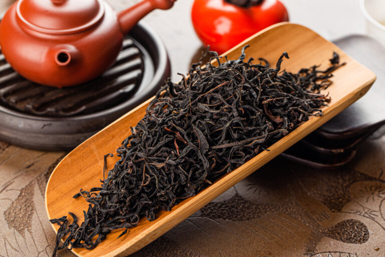 Tea Store in SG : Close-up of premium loose tea leaves, showcasing their rich texture and natural aroma, carefully sourced from high-altitude regions for an authentic brewing experience.