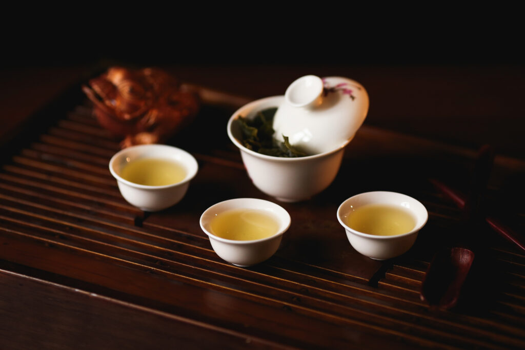 Tea Tasting Guide : Golden hues of freshly steeped Chinese tea reflecting balance and craftsmanship.