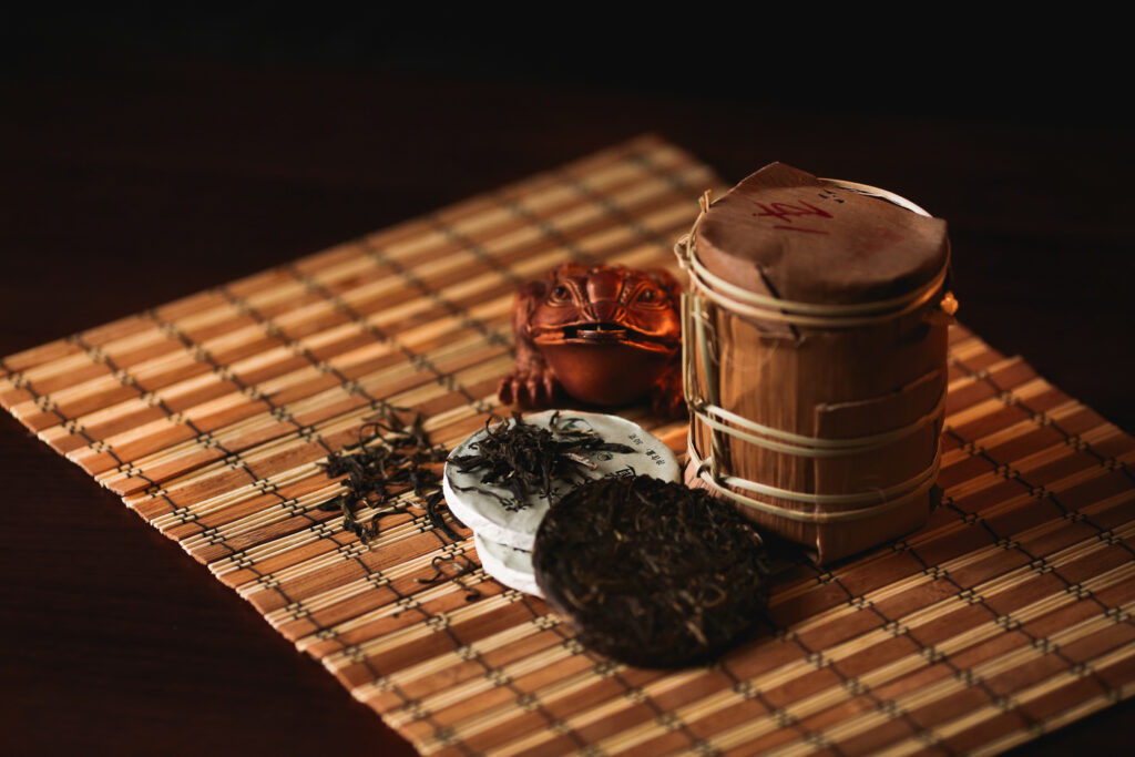Pu erh tea : Compressed Pu erh tea cakes, symbolising tradition and craftsmanship in Chinese tea culture.