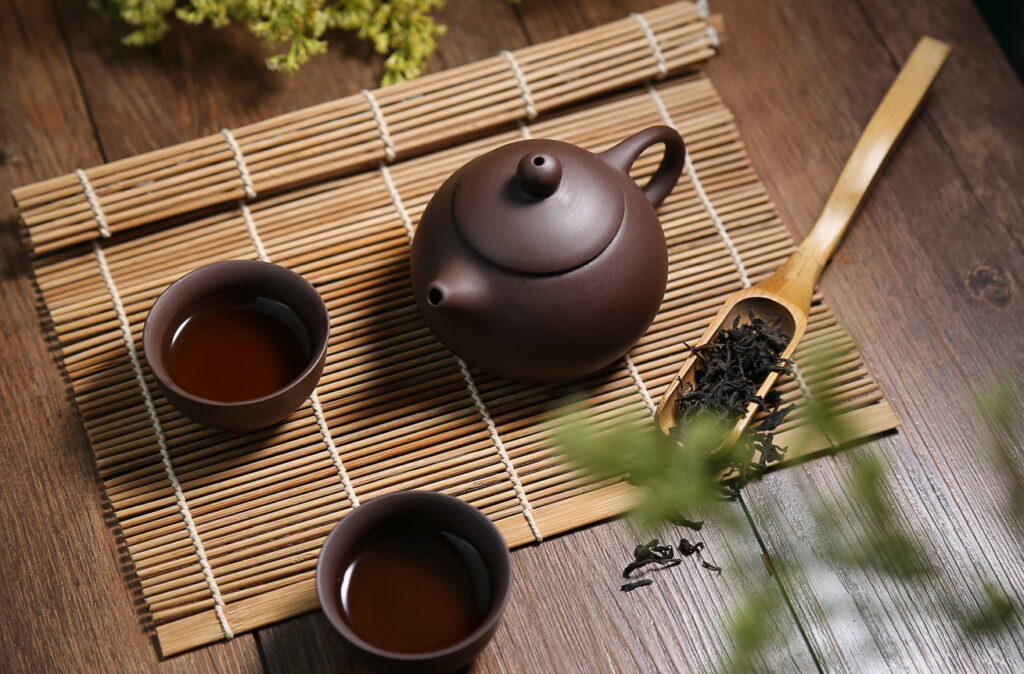 Tea Tasting Guide : Steam rising from a teacup, capturing the calm essence of Chinese tea culture.