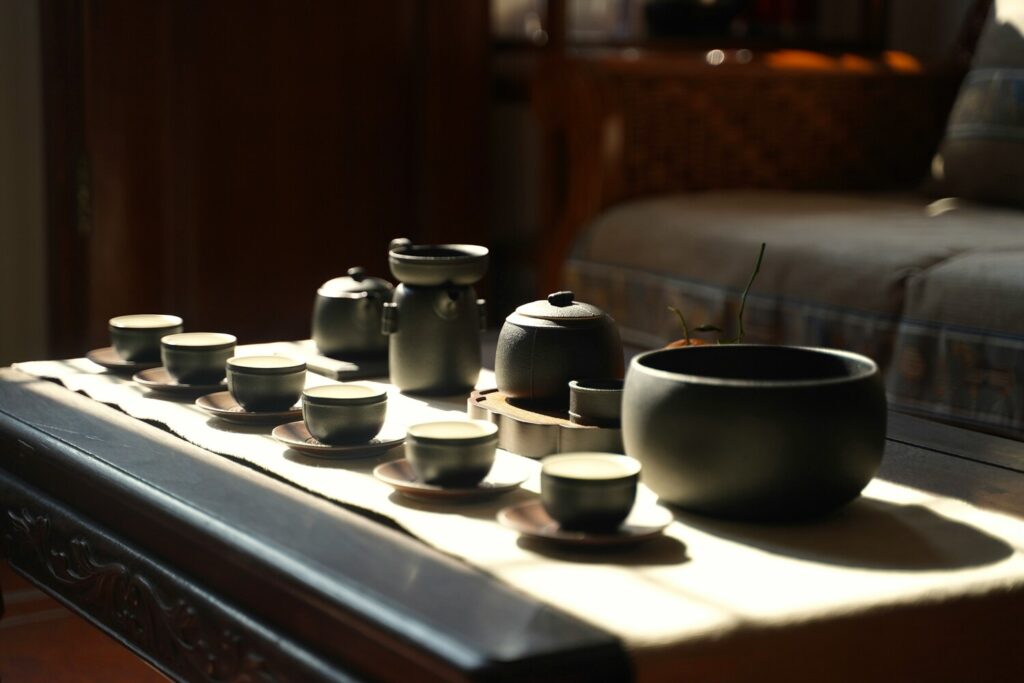 Traditional tea ritual ceremony setup with a tea cups in a serene setting.