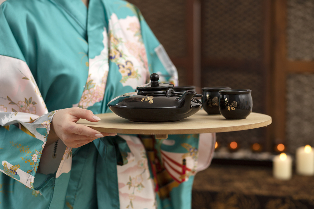 A Korean Darye tea ceremony setup, showcasing celadon teaware and calm, meditative rituals.