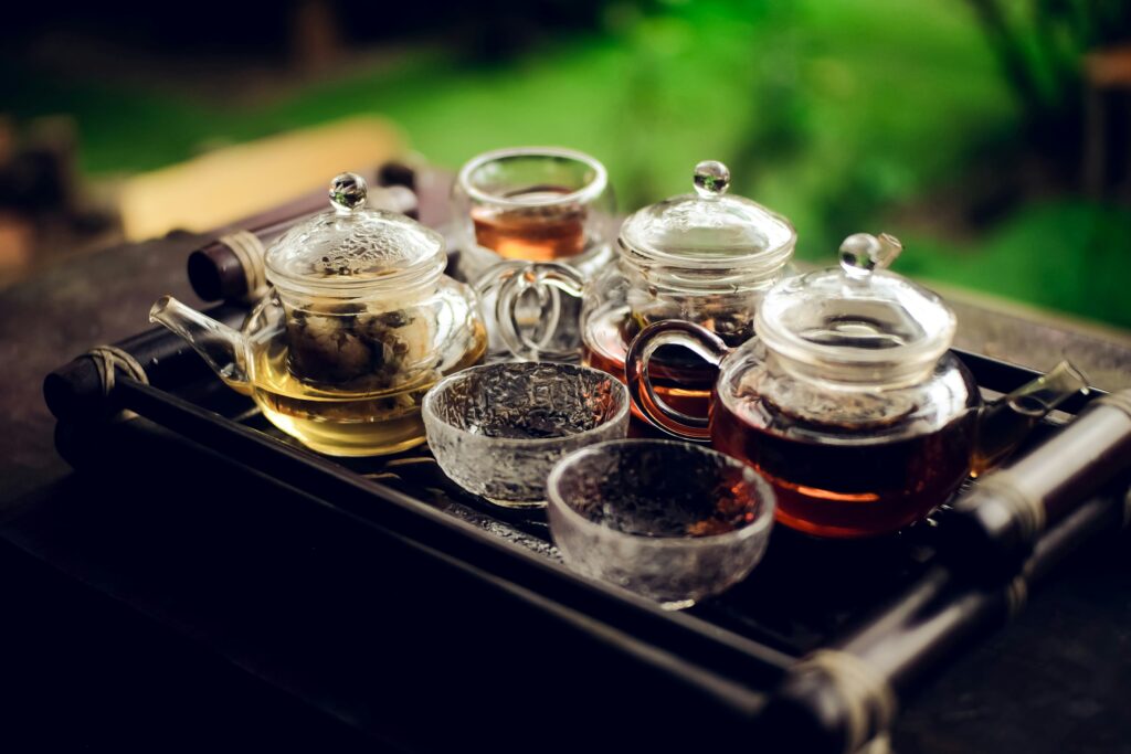 A selection of different tea leaves displayed side by side, revealing variations in colour, texture, and character across tea varieties.