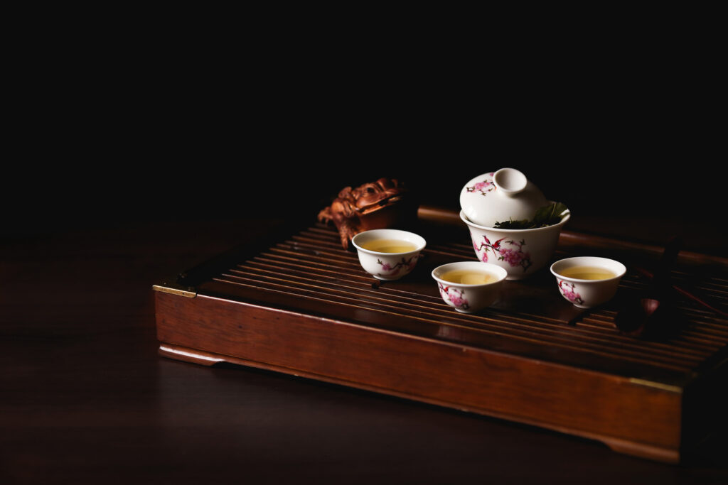 An immersive Chinese tea experience featuring fine teaware, premium leaves, and calming ambience, capturing the essence of traditional tea culture.