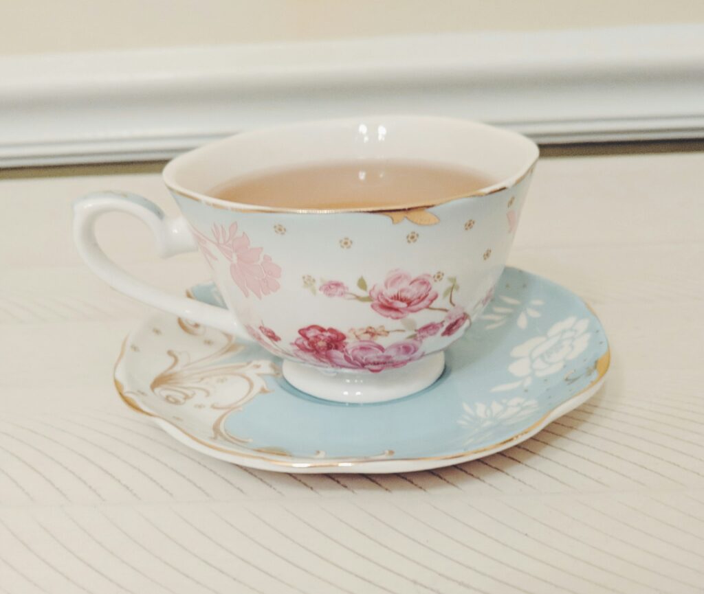 A delicate fine bone china teacup with a smooth, translucent finish, reflecting craftsmanship, elegance, and the timeless beauty of traditional tea culture.