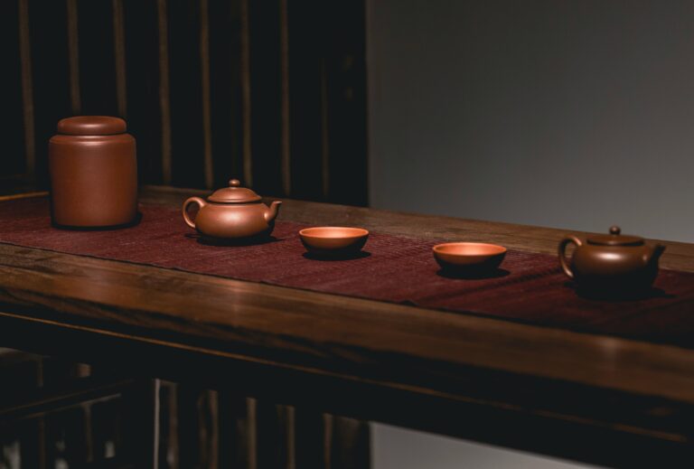 A traditional Chinese tea set arranged with balance and care, featuring porcelain teaware that reflects centuries of tea culture and mindful brewing rituals.