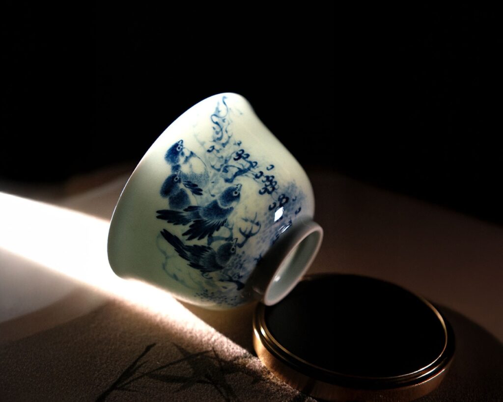 Fine Jingdezhen porcelain tea cups displayed at Tea Room by Ki-Setsu, reflecting centuries of craftsmanship and refined tea culture.