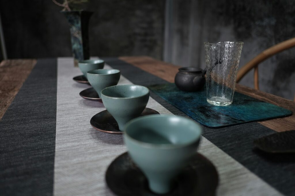 A delicately brewed Chinese tea resting on the table, showcasing clarity, warmth, and the calm elegance of traditional tea culture.
