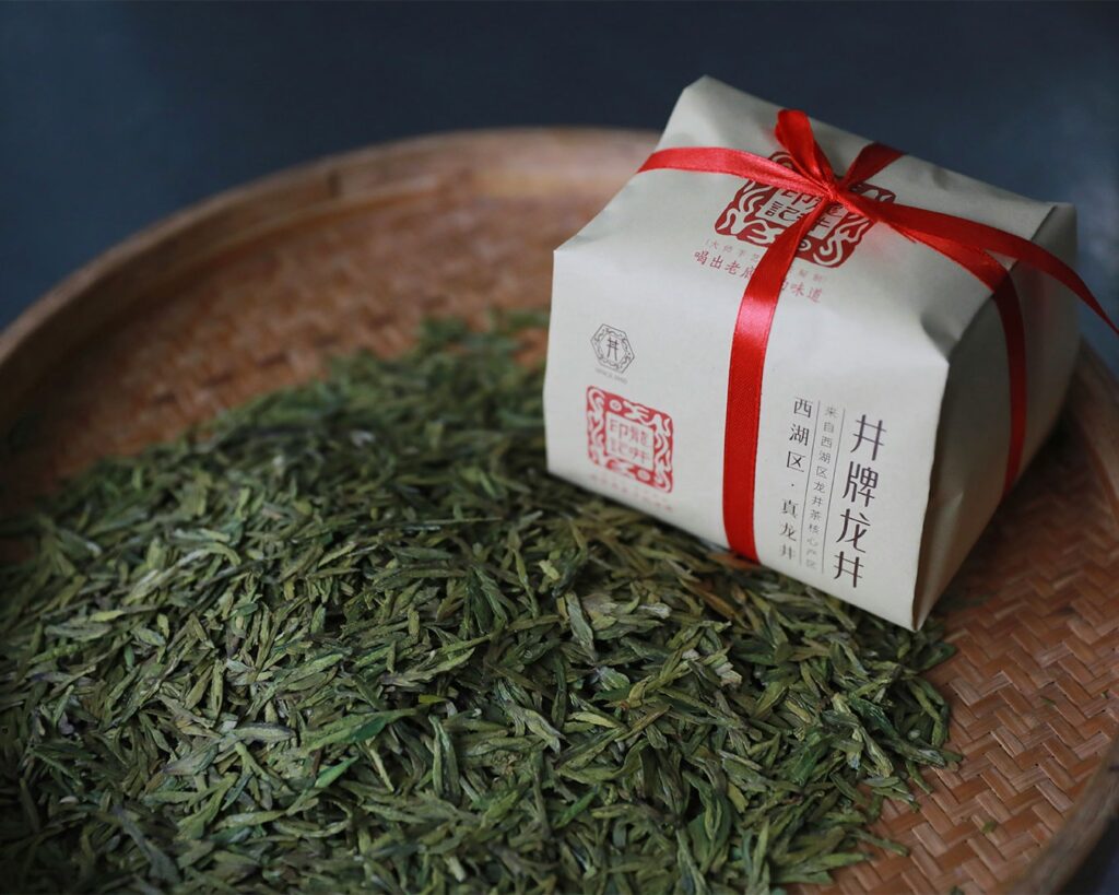 Neatly packed Longjing tea leaves in protective packaging, preserving their freshness and aroma while reflecting careful processing and premium quality.
