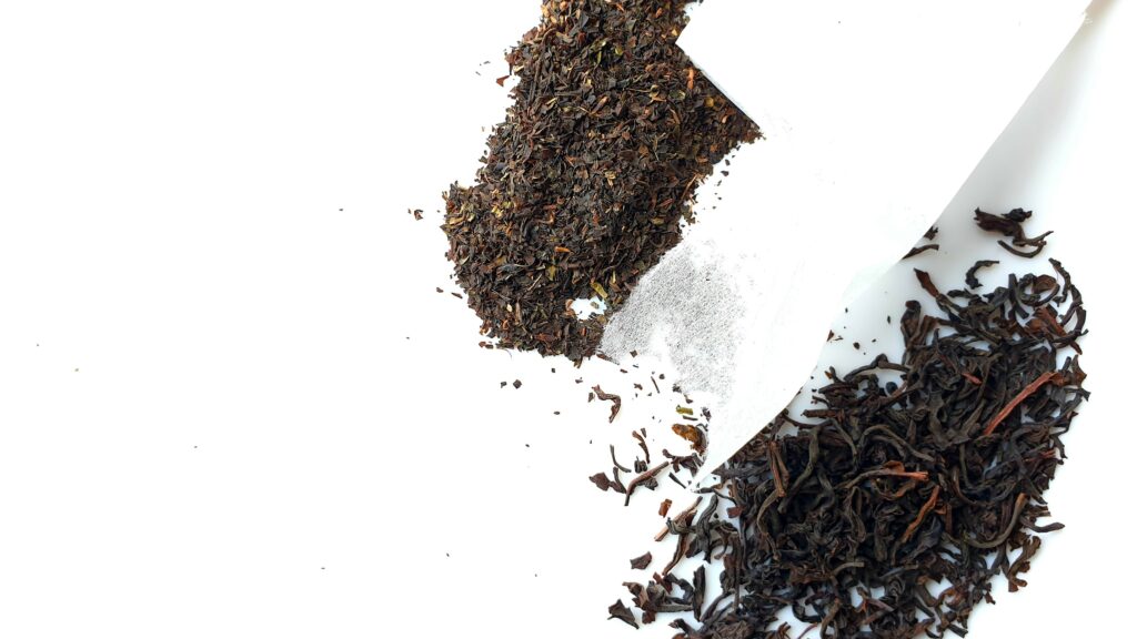 A visual comparison between loose leaf tea and tea bags, illustrating differences in texture, quality, and brewing experience for discerning tea drinkers.