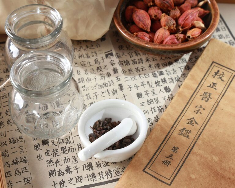 A warm cup of Chinese herbal tea, featuring a rich amber colour and a calm, soothing presentation.