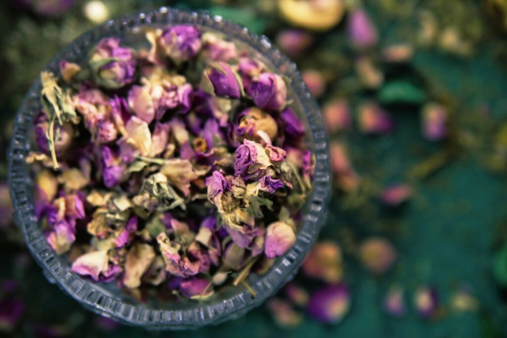 Beautiful dried flower tea blossoms arranged gracefully, capturing the visual elegance and gentle fragrance of floral tea infusions.